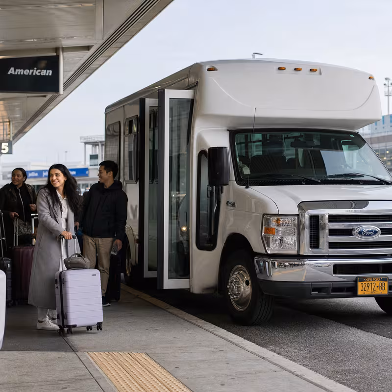 Black Mercedes Sprinter van staged for an Brooklyn Airport Transportation group