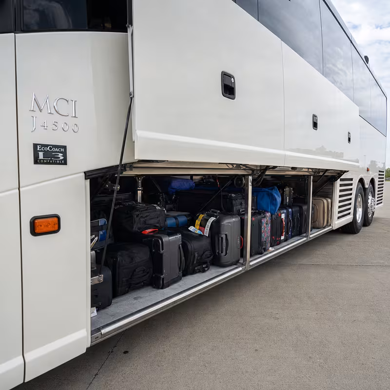 Party bus interior with wraparound leather seating and LED lighting in Brooklyn