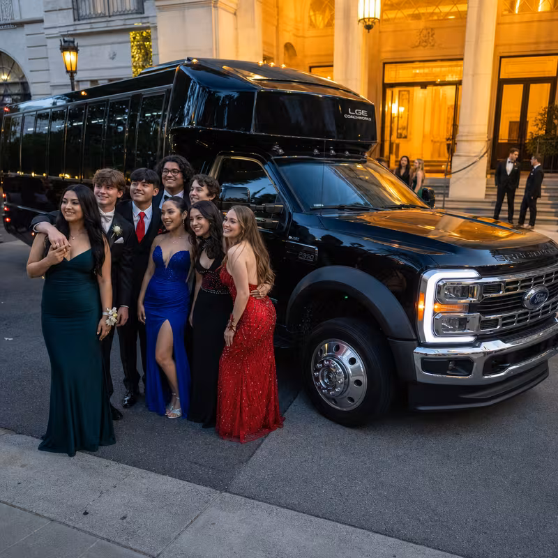 Party bus interior with wraparound leather seating and LED lighting in Brooklyn