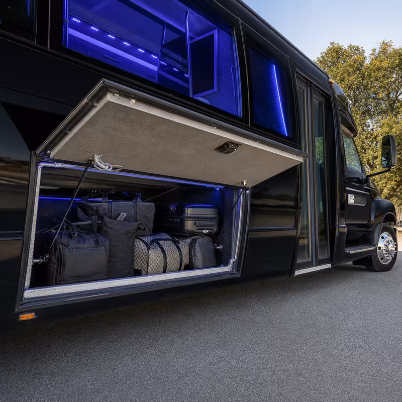 Party bus interior with wraparound leather seating and LED lighting in Brooklyn